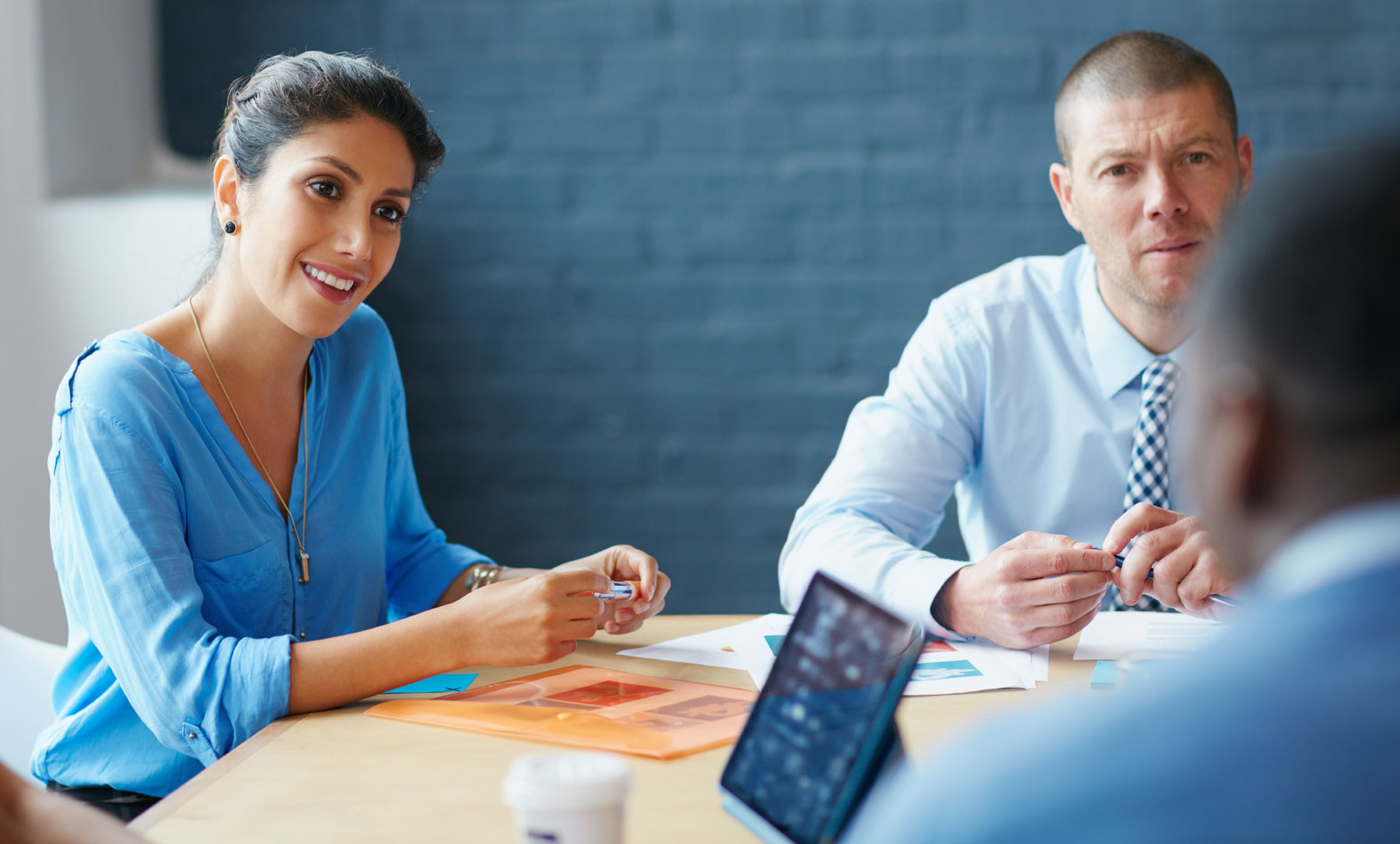 በስብሰባ ላይ ያሉ ሰራተኞች